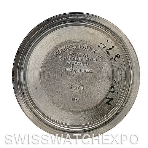 The image shows the inner case back of a Vintage Collection Rolex watch, displaying engraved details.