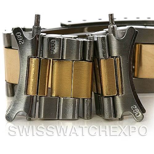 This image shows a close-up of the metal bracelet links for a Rolex Vintage Collection 1675 Men's Stainless Steel Brown Dial 1675 Men's Stainless Steel Brown Dial watch, highlighting its two-tone metal design.