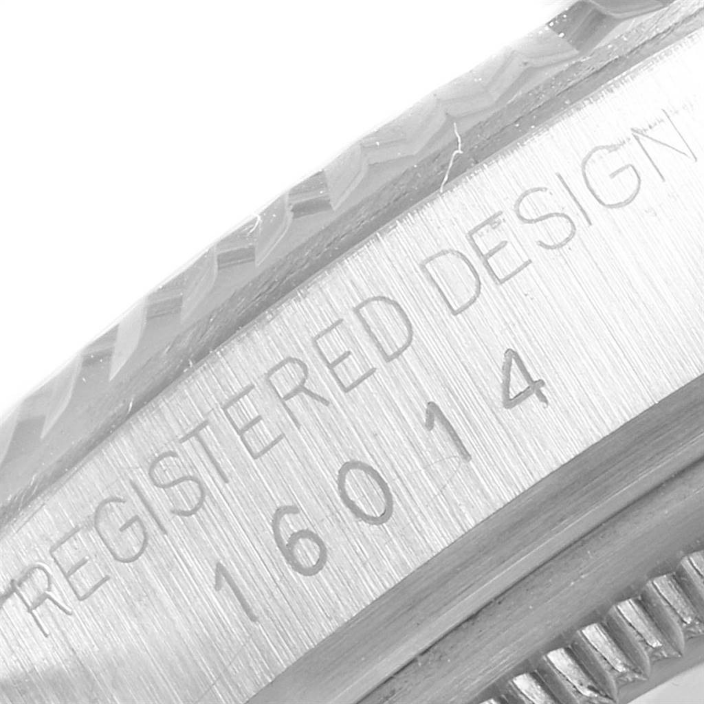 This image shows a close-up of the side casing and bezel of the Rolex Vintage Collection 16014 Men
s Stainless Steel Silver Dial 16014 Men
s Stainless Steel Silver Dial model.