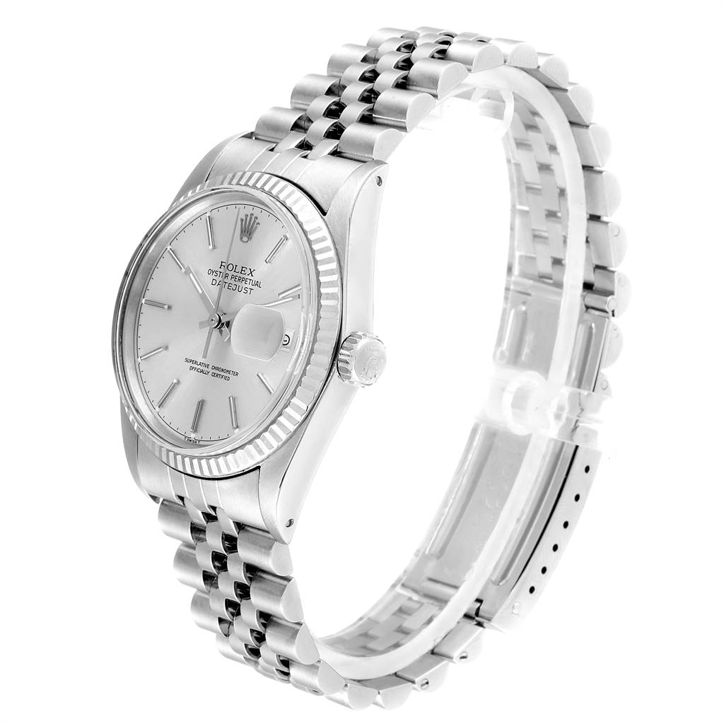 This image shows a Rolex Vintage Collection 16014 Men
s Stainless Steel Silver Dial 16014 Men
s Stainless Steel Silver Dial model watch from a side angle, displaying its face, bezel, crown, and bracelet.