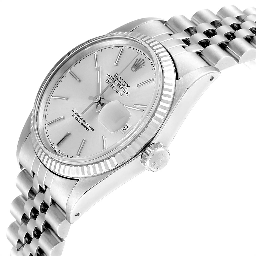The Rolex Vintage Collection 16014 Men
s Stainless Steel Silver Dial 16014 Men
s Stainless Steel Silver Dial watch is shown from a side angle, highlighting the face, bezel, crown, and part of the bracelet.