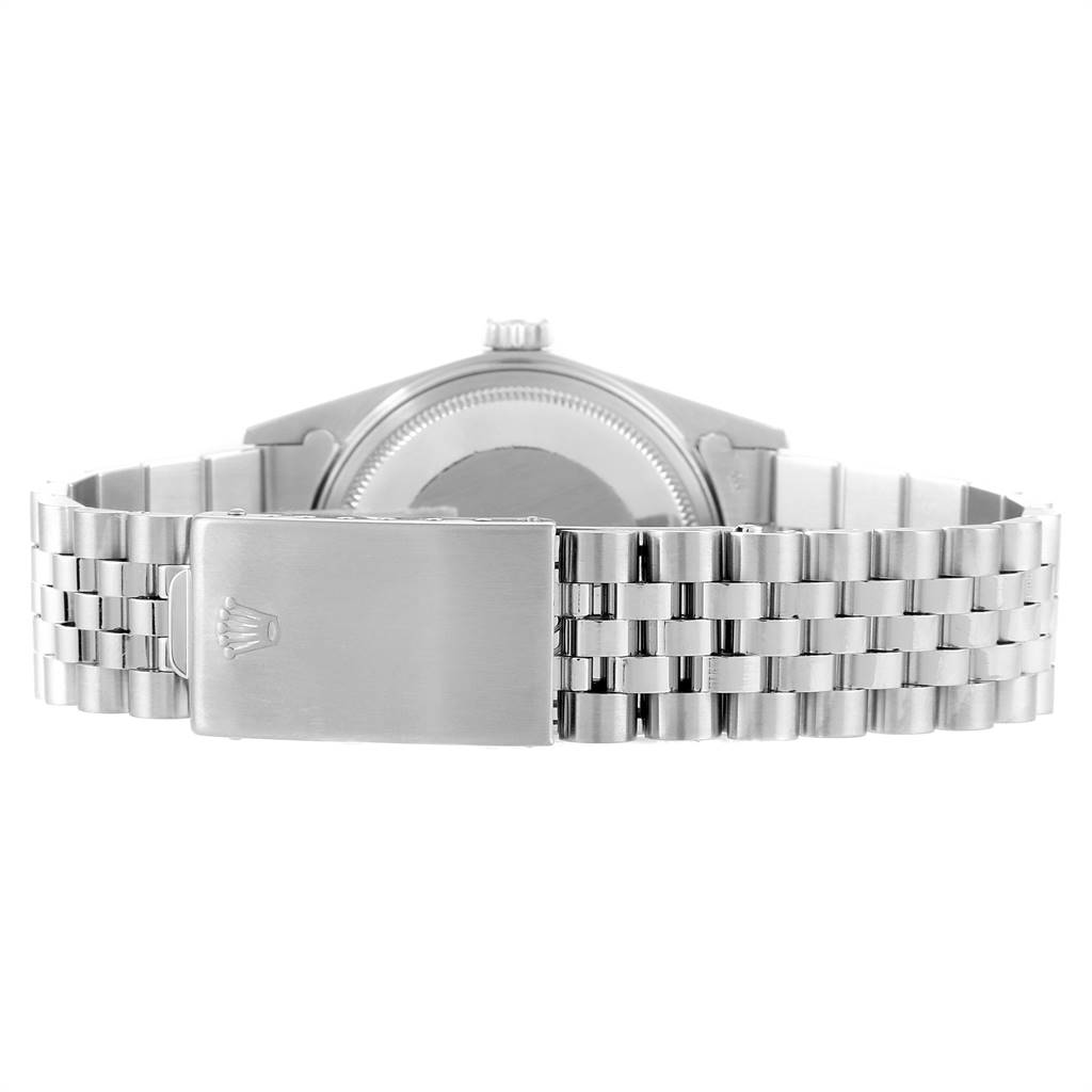 The image shows the back and bracelet clasp of a Vintage Collection model by Rolex.