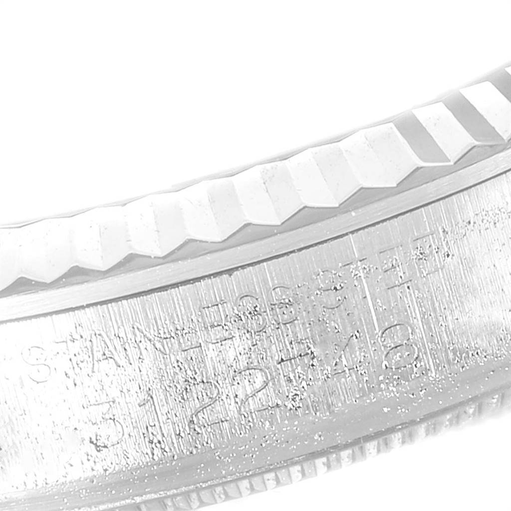 The image shows a close-up view of the case side and engraved model number of a Rolex Vintage Collection 1601 Men
s Stainless Steel Silver Dial 1601 Men
s Stainless Steel Silver Dial watch.