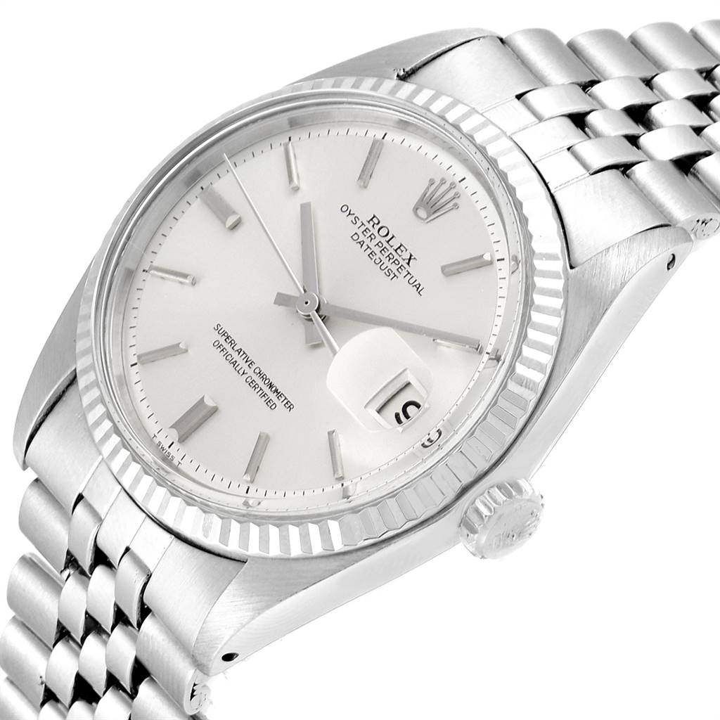 The Rolex Vintage Collection 1601 Men
s Stainless Steel Silver Dial 1601 Men
s Stainless Steel Silver Dial watch is shown at an angled close-up, highlighting its face, bezel, and a portion of its bracelet.