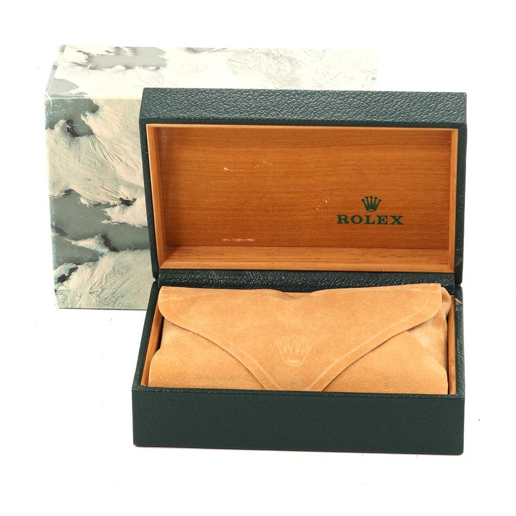 The image shows the box and suede pouch for a Rolex Vintage Collection 1601 Men
s Stainless Steel Silver Dial 1601 Men
s Stainless Steel Silver Dial model, with the box open and the pouch inside.