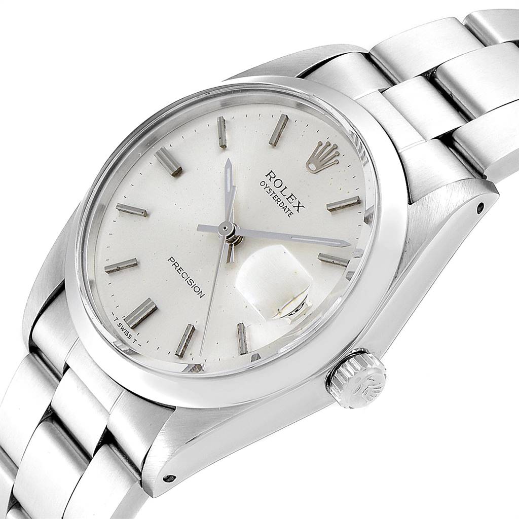 This image shows a close-up, angled view of a Rolex Vintage Collection 6694 Men
s Stainless Steel Silver Dial 6694 Men
s Stainless Steel Silver Dial Oysterdate watch, highlighting its face, crown, and bracelet links.