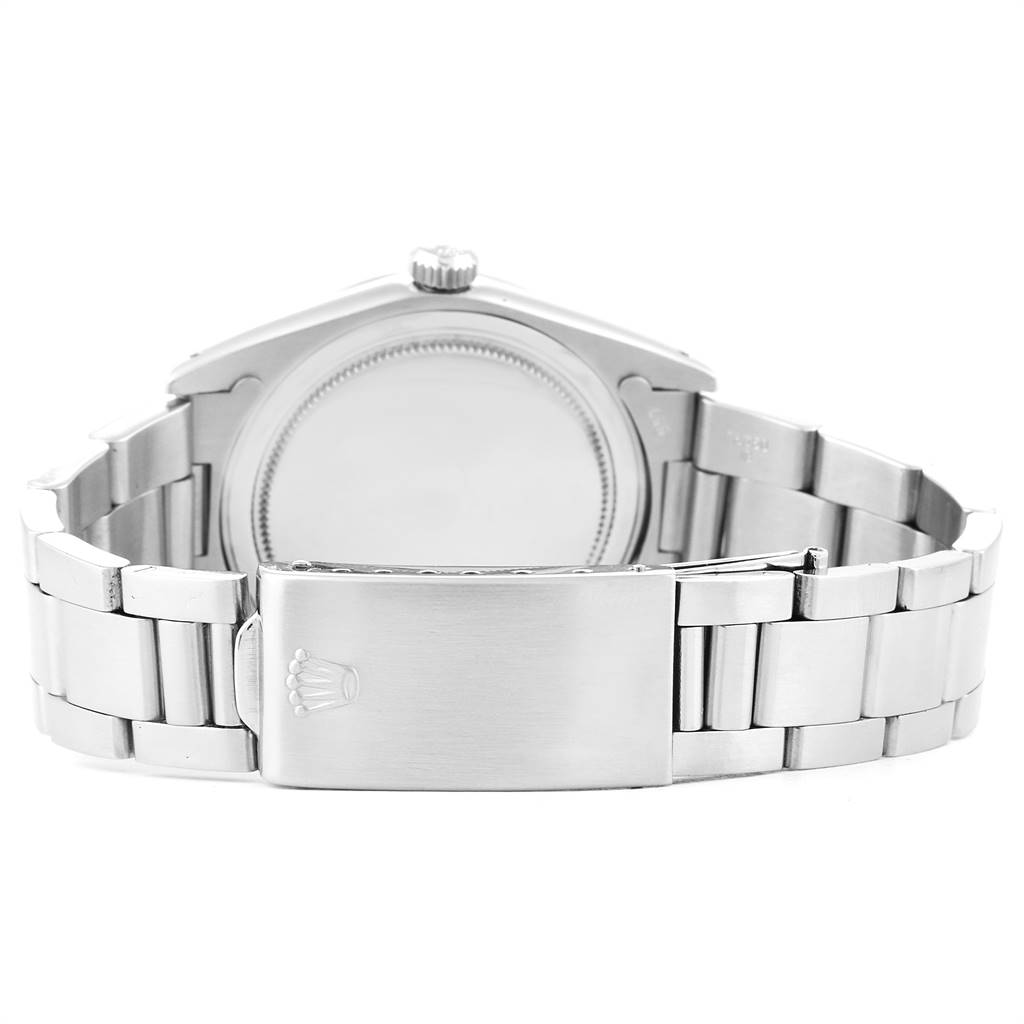 This image shows a rear view of the Rolex Vintage Collection 6694 Men
s Stainless Steel Silver Dial 6694 Men
s Stainless Steel Silver Dial watch, highlighting the case back and metal bracelet with clasp.