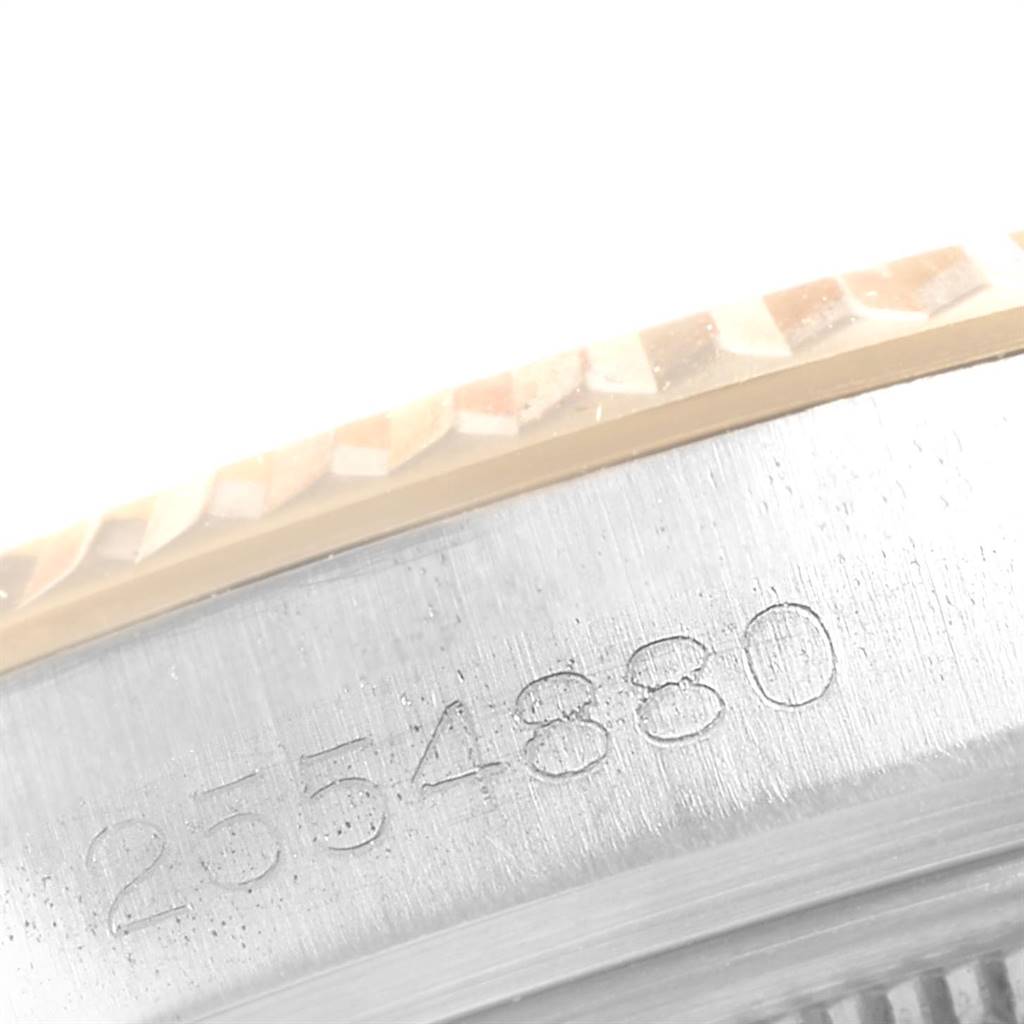 This image shows a close-up of the serial number "2554880" engraved on the case of a Rolex Vintage Collection 1601 Men's Steel and Gold (two tone) Grey Dial 1601 Men's Steel and Gold (two tone) Grey Dial watch.