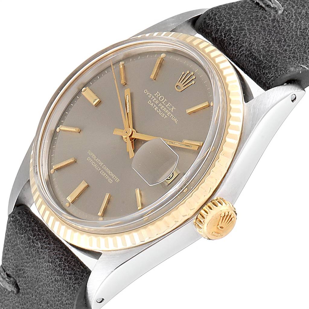 The Rolex Vintage Collection 1601 Men's Steel and Gold (two tone) Grey Dial 1601 Men's Steel and Gold (two tone) Grey Dial watch is angled to show its face, bezel, crown, and part of the strap.