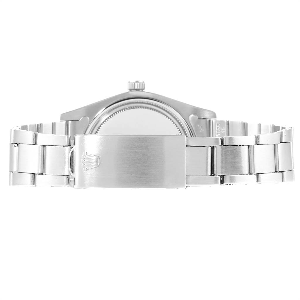 The image shows the backside and clasp of a Rolex Vintage Collection 6694 Men's Stainless Steel Black Dial 6694 Men's Stainless Steel Black Dial watch, highlighting its metal bracelet.