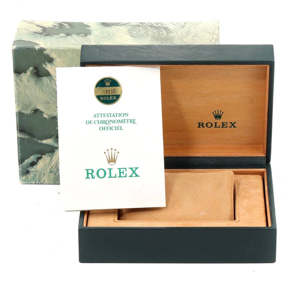 The image shows an open Rolex Vintage Collection 16030 Men's Stainless Steel Silver Dial 16030 Men's Stainless Steel Silver Dial watch box with paperwork and a cushion inside.