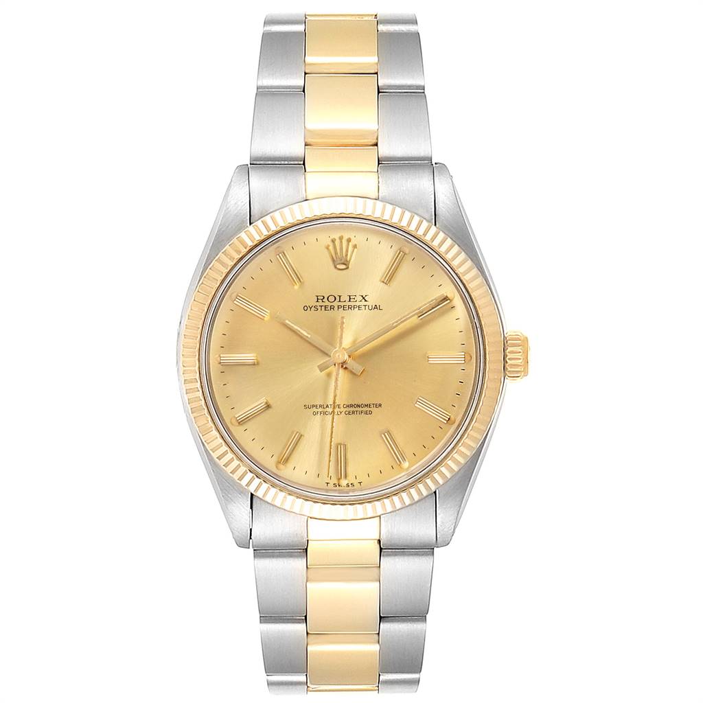 The Rolex Vintage Collection 1005 Men
s Steel and Gold (two tone) Champagne Dial 1005 Men
s Steel and Gold (two tone) Champagne Dial watch is shown from a front angle displaying its gold dial, bezel, and two-tone bracelet.