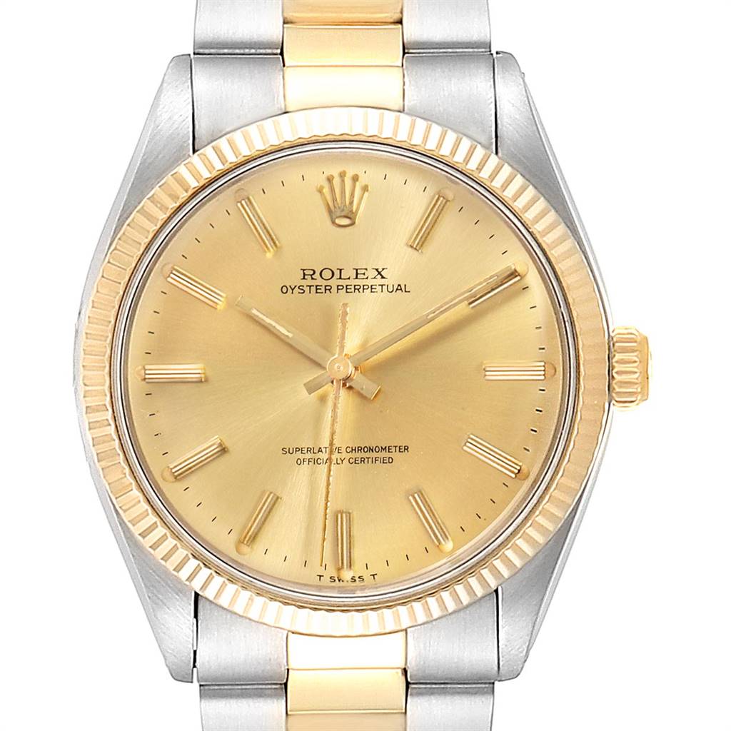The image shows a front view of the Rolex Vintage Collection 1005 Men
s Steel and Gold (two tone) Champagne Dial 1005 Men
s Steel and Gold (two tone) Champagne Dial model with a gold dial and two-tone metal bracelet.