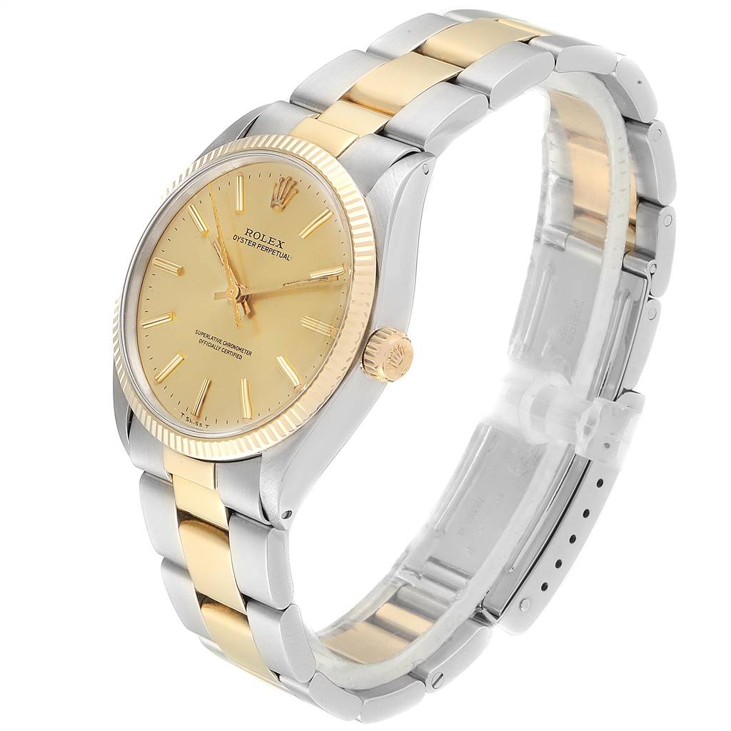 The Rolex Vintage Collection 1005 Men
s Steel and Gold (two tone) Champagne Dial 1005 Men
s Steel and Gold (two tone) Champagne Dial watch is shown at a three-quarter angle, highlighting the gold dial, bezel, and bicolor bracelet.