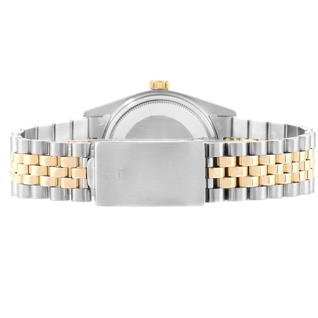 The image shows the back view of the Rolex Vintage Collection 16013 Men's Stainless Steel Black Dial 16013 Men's Stainless Steel Black Dial watch, highlighting its two-tone bracelet and clasp.