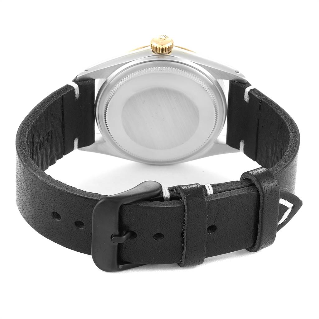 The image shows the back view of the Rolex Vintage Collection 16013 Men
s Stainless Steel Black Dial 16013 Men
s Stainless Steel Black Dial watch, highlighting the case back, crown, and leather strap with buckle.