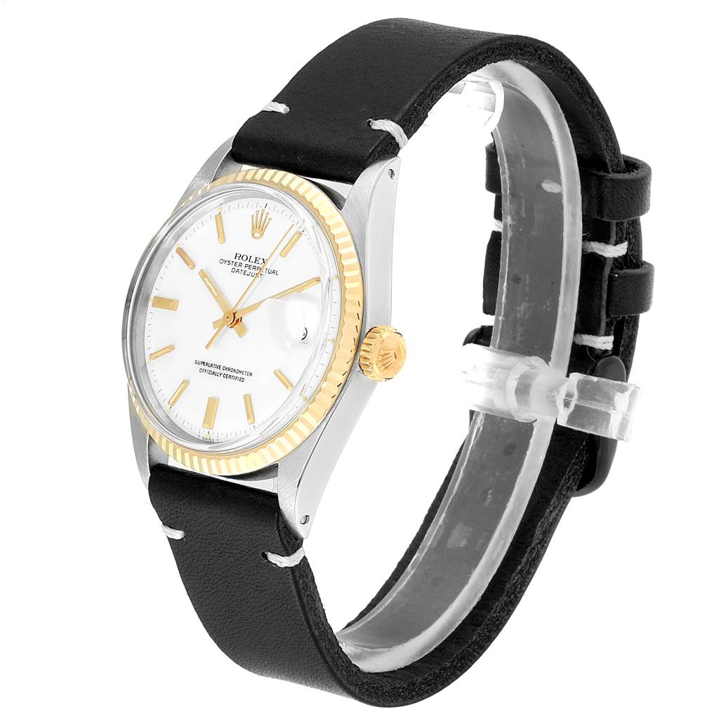 The Rolex Vintage Collection 1601 Men's Steel and Gold (two tone) White Dial 1601 Men's Steel and Gold (two tone) White Dial watch is shown at a three-quarter angle, displaying the face, bezel, crown, and leather strap.