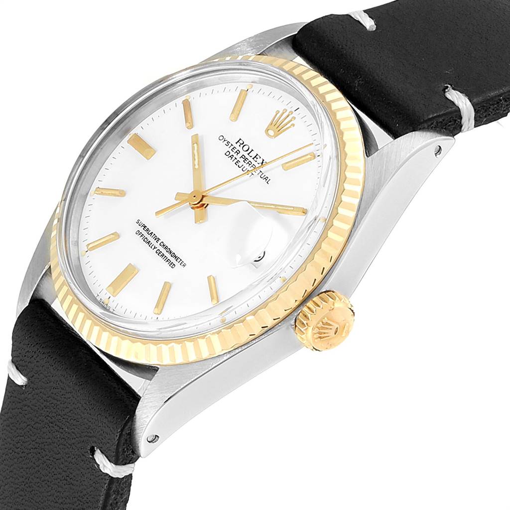 The image shows a close-up angled view of a Rolex Vintage Collection 1601 Men's Steel and Gold (two tone) White Dial 1601 Men's Steel and Gold (two tone) White Dial watch, highlighting the dial, crown, and part of the strap.