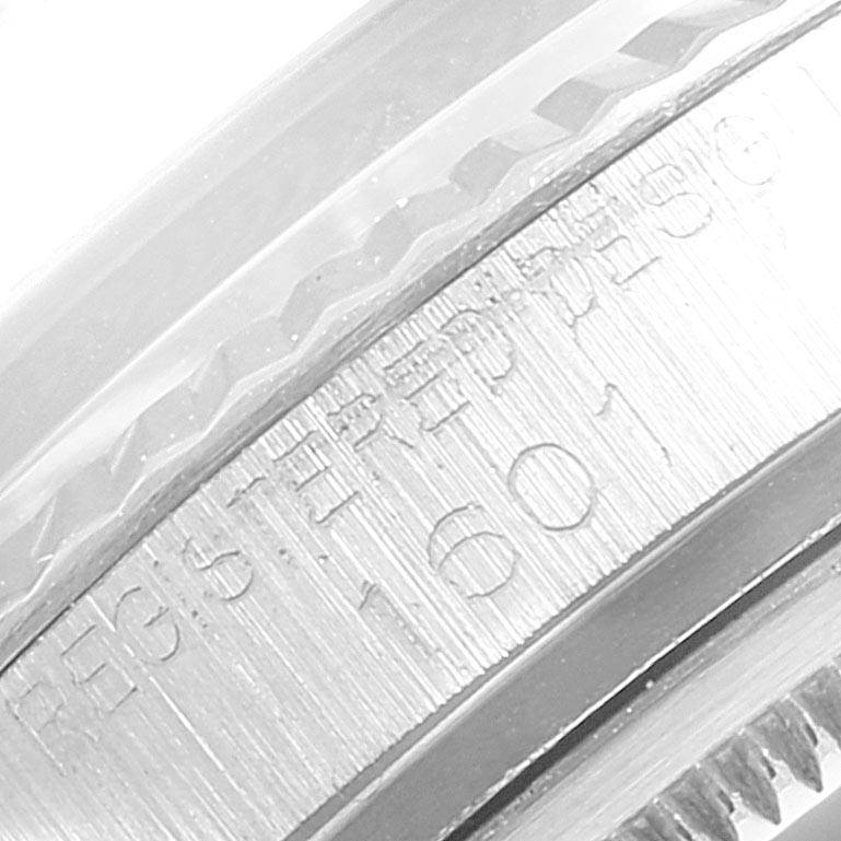 This close-up image shows the engraved side of the case of a Vintage Collection model by Rolex.