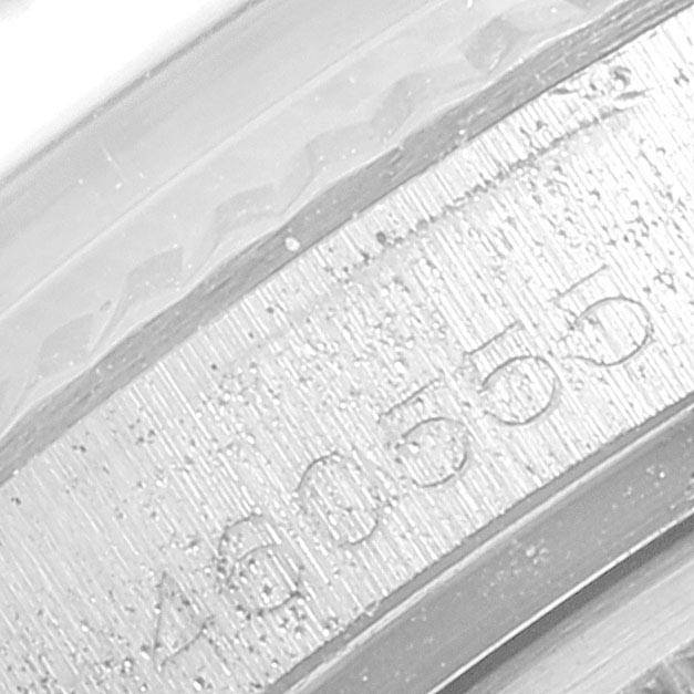 This close-up image shows the serial number engraving on the side of the case of the Rolex Vintage Collection 1601 Men's Stainless Steel Silver Dial 1601 Men's Stainless Steel Silver Dial model.