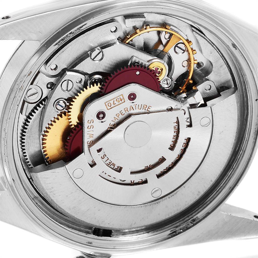 The image shows the intricate inner mechanical components and movement of a Rolex Vintage Collection 1601 Men's Stainless Steel Silver Dial 1601 Men's Stainless Steel Silver Dial model watch.