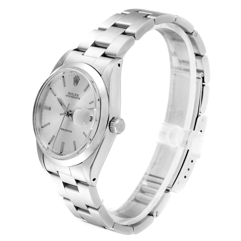 The image shows a side profile of the Rolex Vintage Collection 6694 Men
s Stainless Steel Silver Dial 6694 Men
s Stainless Steel Silver Dial watch, highlighting its face, bezel, crown, and bracelet.