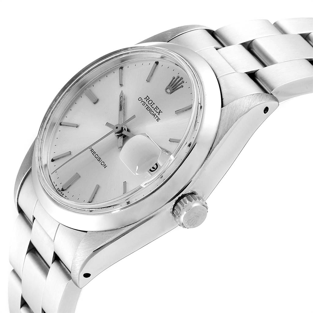 The image shows a side-angle view of the Rolex Vintage Collection 6694 Men
s Stainless Steel Silver Dial 6694 Men
s Stainless Steel Silver Dial watch, highlighting the case, crown, dial, and bracelet.