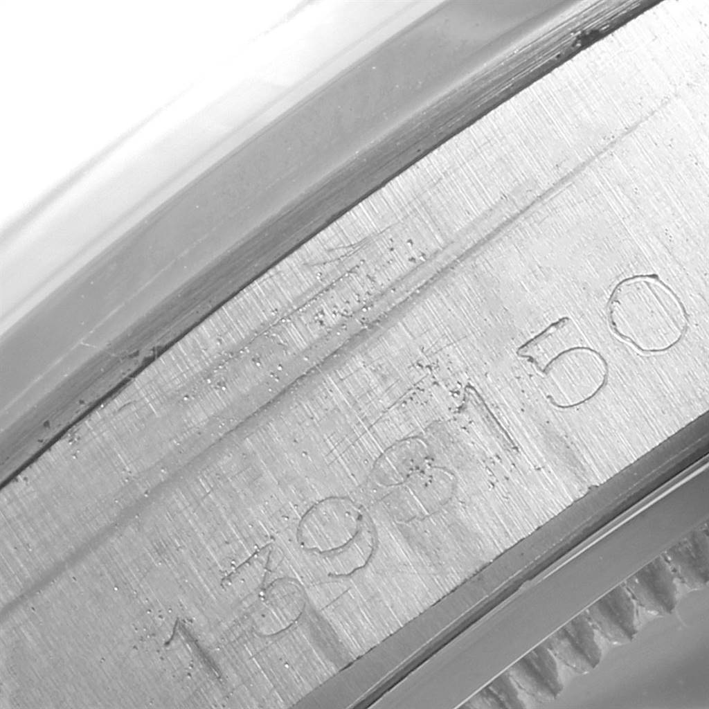 This close-up image shows the engraved serial number on the case of a Vintage Collection watch by Rolex.