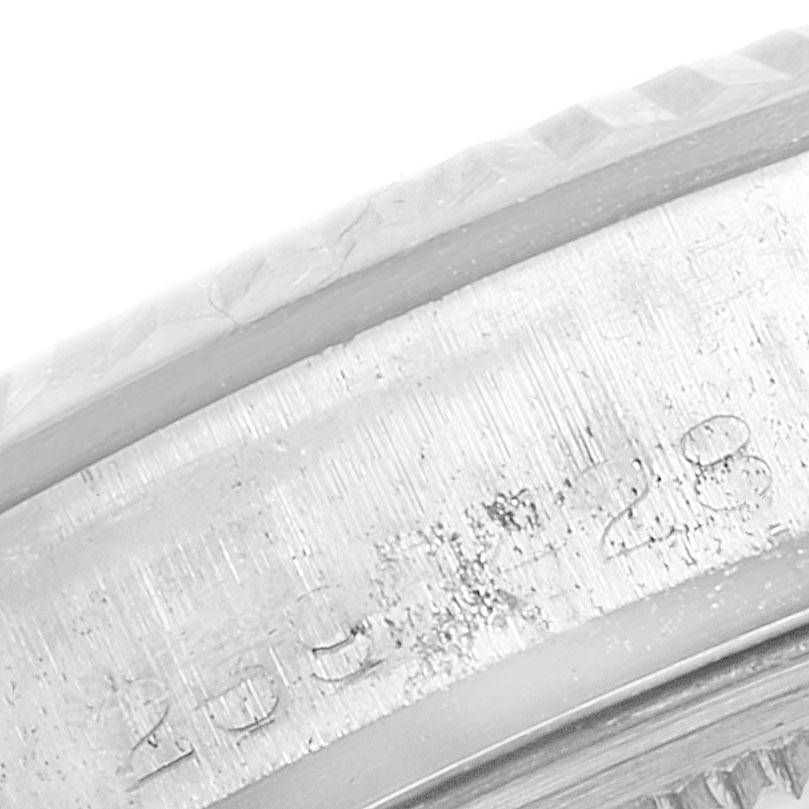 This is a close-up angled view of the engraved rim on the Rolex Vintage Collection 1601 Men
s Stainless Steel Silver Dial 1601 Men
s Stainless Steel Silver Dial model watch.