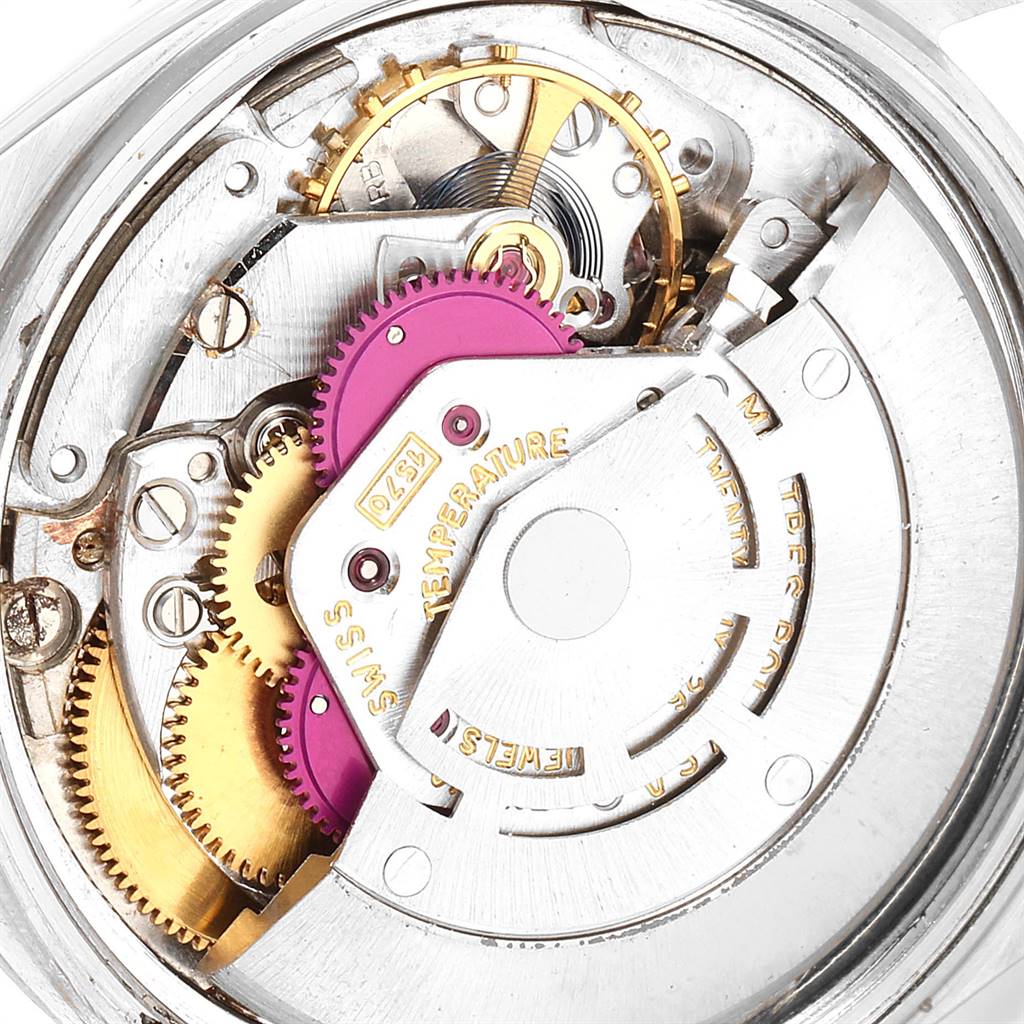 This image shows an inner mechanism of the Rolex Vintage Collection 1601 Men
s Stainless Steel Silver Dial 1601 Men
s Stainless Steel Silver Dial model, showcasing gears and components.