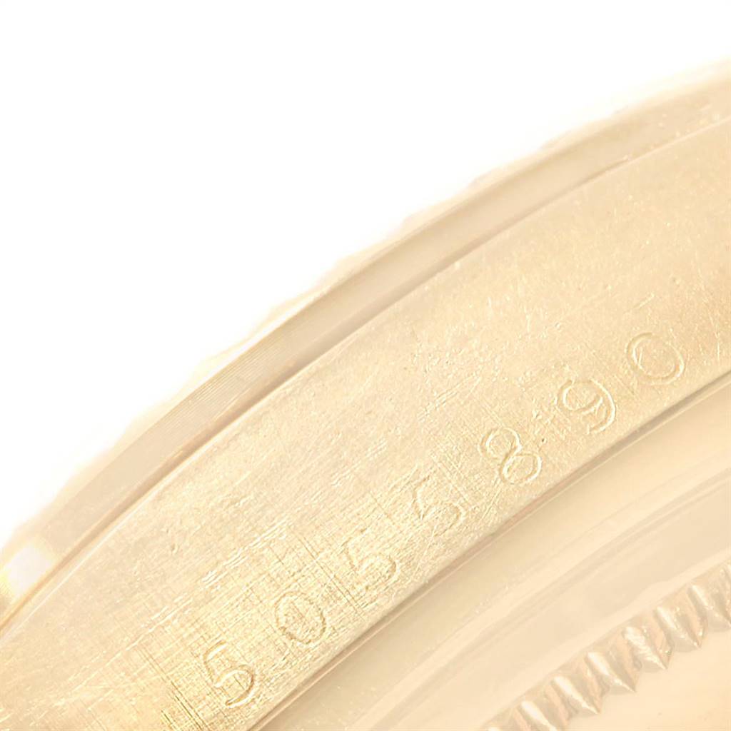 This is a close-up of the serial number engraving on a Rolex Vintage Collection 1803 Men
s Yellow Gold Silver Dial 1803 Men
s Yellow Gold Silver Dial watch bezel.