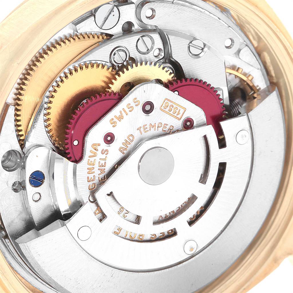 This close-up image showcases the intricate inner mechanisms of a Rolex Vintage Collection 1803 Men
s Yellow Gold Silver Dial 1803 Men
s Yellow Gold Silver Dial watch.
