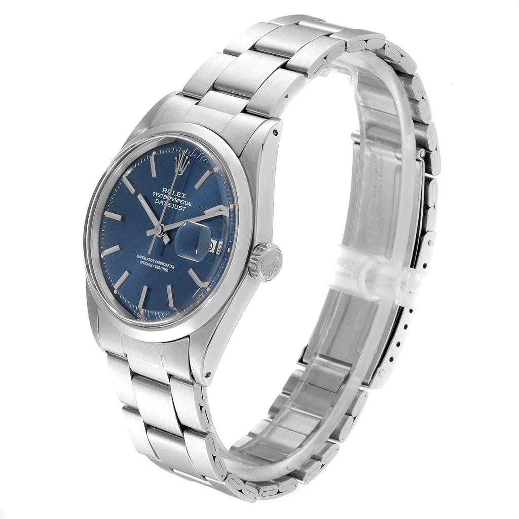 The image shows a side and front angle of a Rolex Vintage Collection 1600 Men's Stainless Steel Blue Dial 1600 Men's Stainless Steel Blue Dial Oyster Perpetual Datejust watch, highlighting the dial, bracelet, and crown.