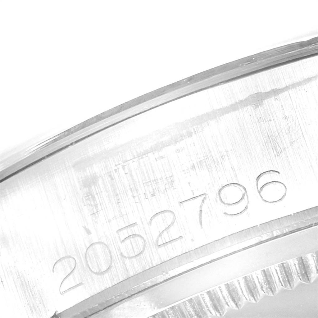 This image shows a close-up of the serial number engraved on the case edge of the Rolex Vintage Collection 6694 Men
s Stainless Steel Silver Dial 6694 Men
s Stainless Steel Silver Dial watch.