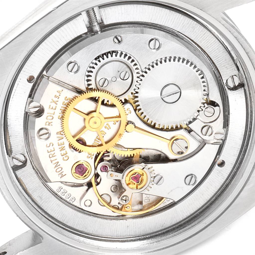 The image shows the internal mechanism and gears of a Rolex Vintage Collection 6694 Men
s Stainless Steel Silver Dial 6694 Men
s Stainless Steel Silver Dial watch, viewed from the back.
