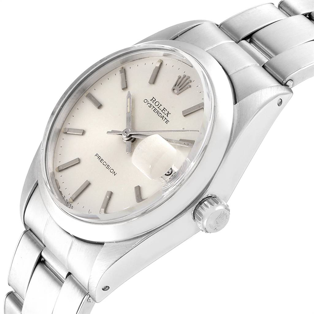 This image shows a close-up angled view of the Rolex Vintage Collection 6694 Men
s Stainless Steel Silver Dial 6694 Men
s Stainless Steel Silver Dial Oysterdate watch, displaying the dial, crown, and part of the bracelet.
