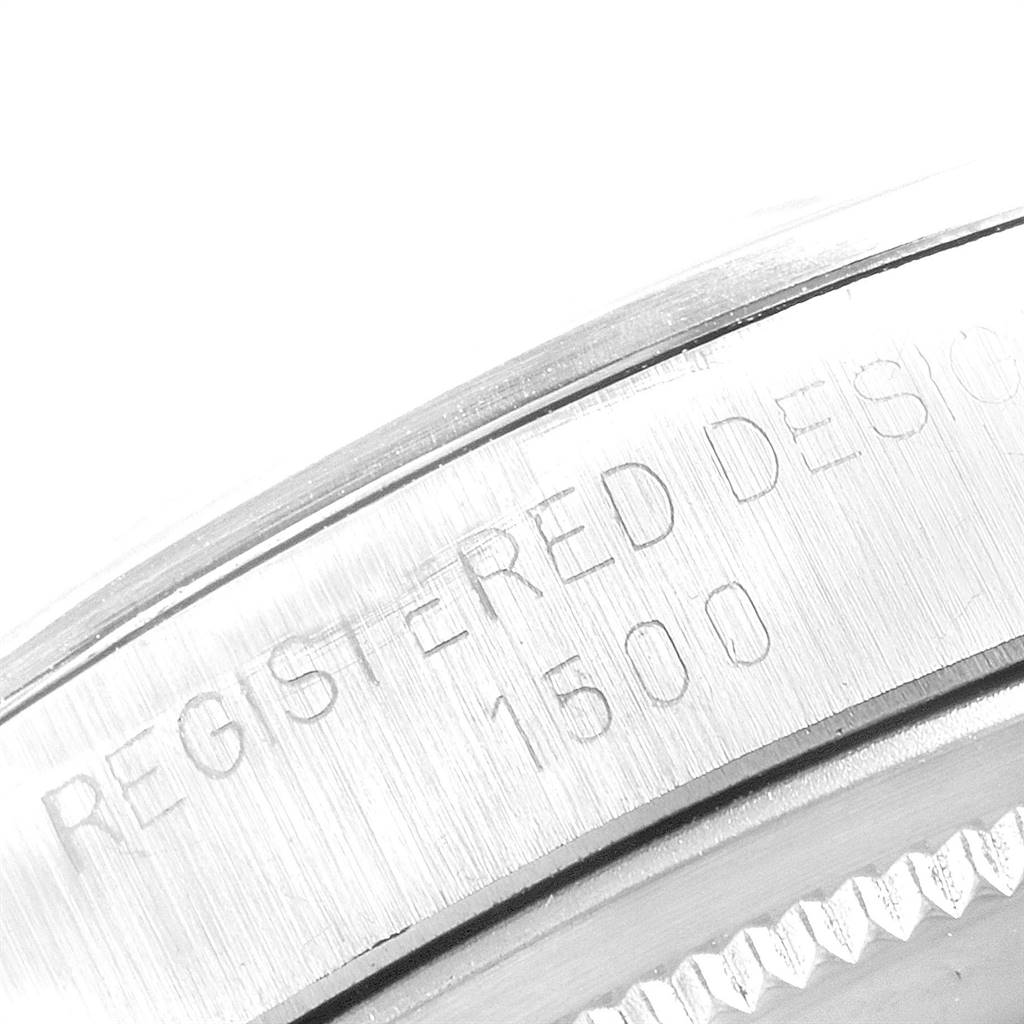 The image shows a close-up of the bezel and engraved design number (1500) of a Rolex Vintage Collection 15000 Men
s Stainless Steel Silver Dial 15000 Men
s Stainless Steel Silver Dial model watch.