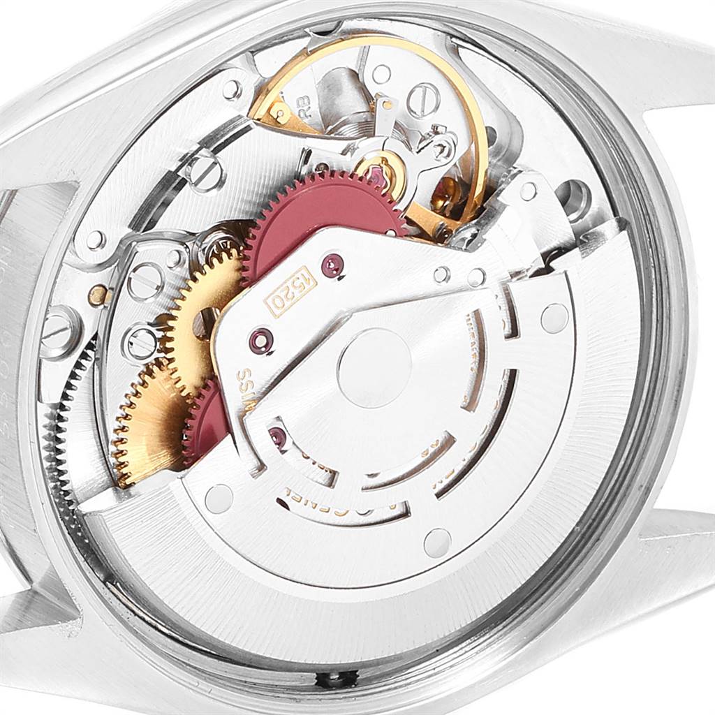 The image shows a close-up view of the movement and inner components of a Rolex Vintage Collection 5500 Men's Stainless Steel Blue Dial 5500 Men's Stainless Steel Blue Dial model watch.