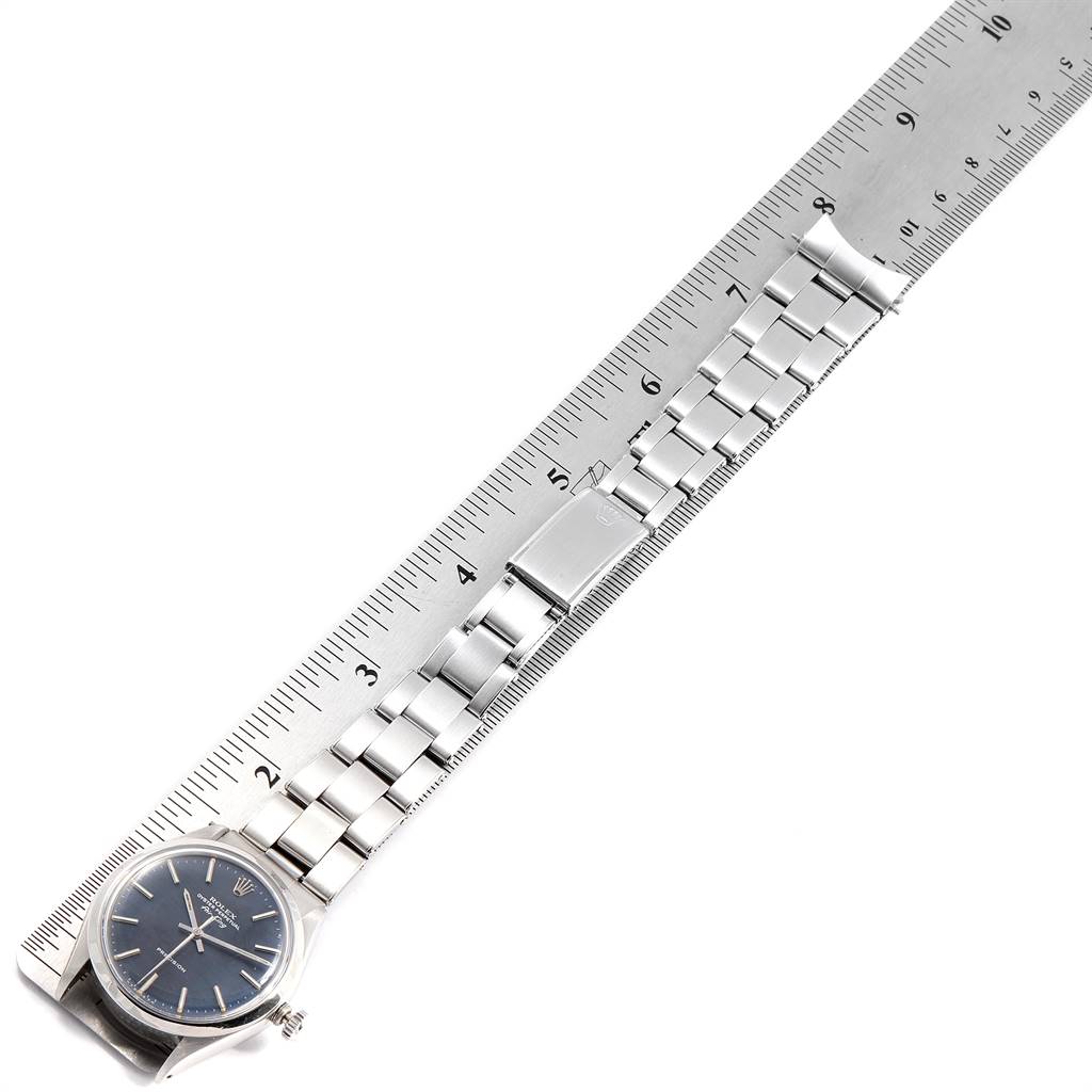 The image shows the face and full bracelet of the Rolex Vintage Collection 5500 Men's Stainless Steel Blue Dial 5500 Men's Stainless Steel Blue Dial watch, measured with a ruler.