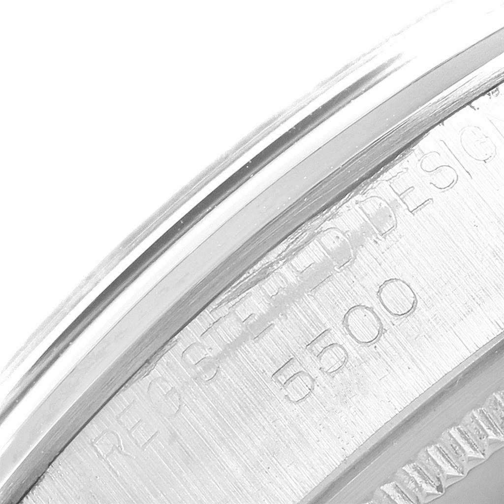 This close-up image shows part of the engraved bezel on the Vintage Collection model by Rolex, with the model number "5500."