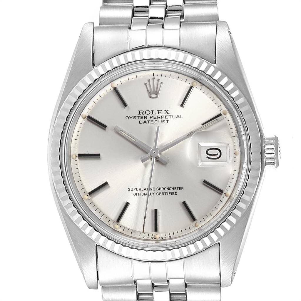 The image displays a front view of the Rolex Vintage Collection 1601 Men
s Stainless Steel Silver Dial 1601 Men
s Stainless Steel Silver Dial Oyster Perpetual Datejust watch, showcasing its dial, bezel, and part of the bracelet.