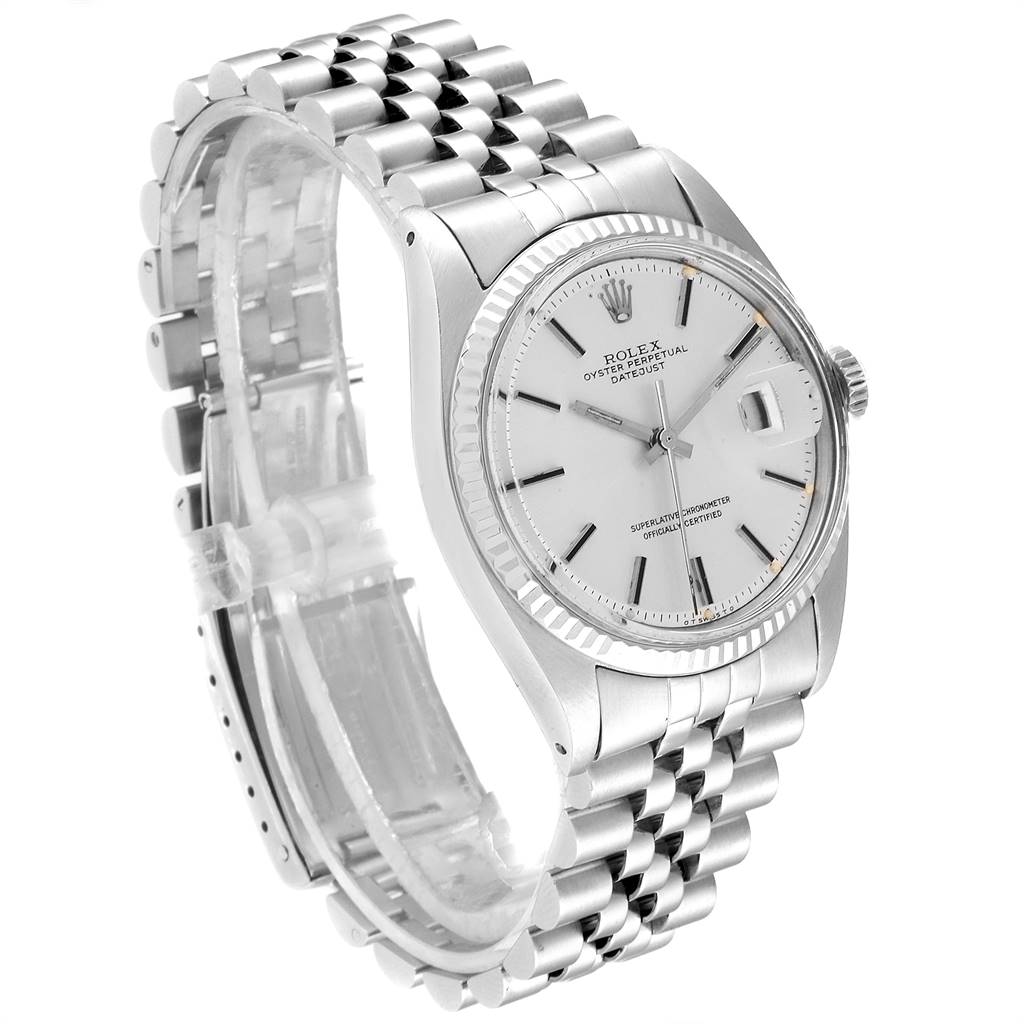 The image shows a side view of the Rolex Vintage Collection 1601 Men
s Stainless Steel Silver Dial 1601 Men
s Stainless Steel Silver Dial watch, highlighting the bracelet, case, and face.