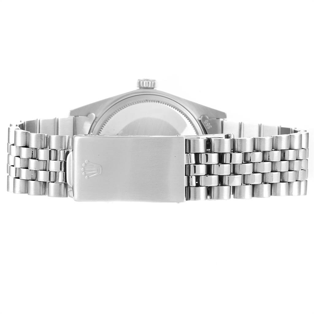 The image shows the back view of the bracelet and clasp of a Rolex Vintage Collection 1601 Men
s Stainless Steel Silver Dial 1601 Men
s Stainless Steel Silver Dial model watch.