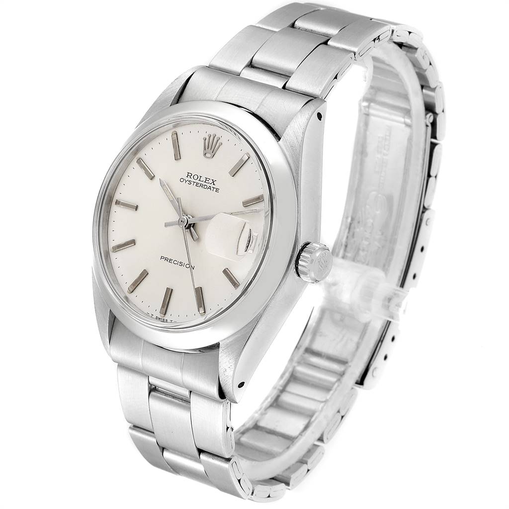 The image shows a side and front angle of a Rolex Vintage Collection 6694 Men
s Stainless Steel Silver Dial 6694 Men
s Stainless Steel Silver Dial Oysterdate watch, highlighting its face, bezel, and bracelet.