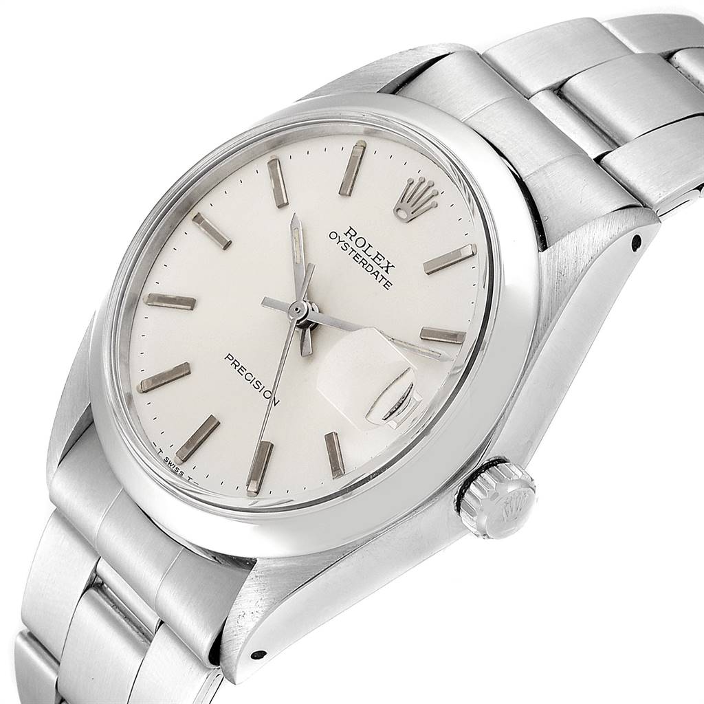 The image shows a close-up side angle of the Rolex Vintage Collection 6694 Men
s Stainless Steel Silver Dial 6694 Men
s Stainless Steel Silver Dial Oysterdate watch, highlighting the dial, crown, and bracelet.