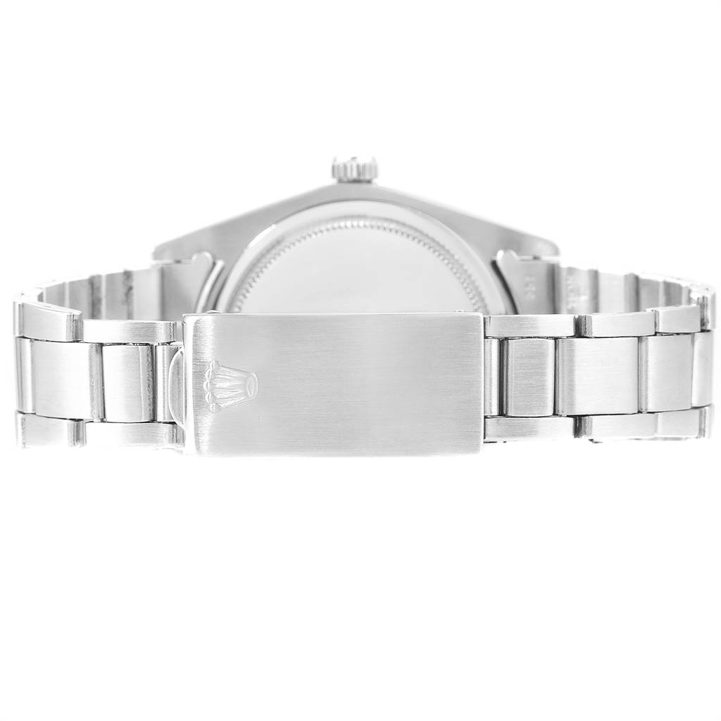 The image shows the back view of the Rolex Vintage Collection 6694 Men
s Stainless Steel Silver Dial 6694 Men
s Stainless Steel Silver Dial model with a focus on the bracelet and clasp.