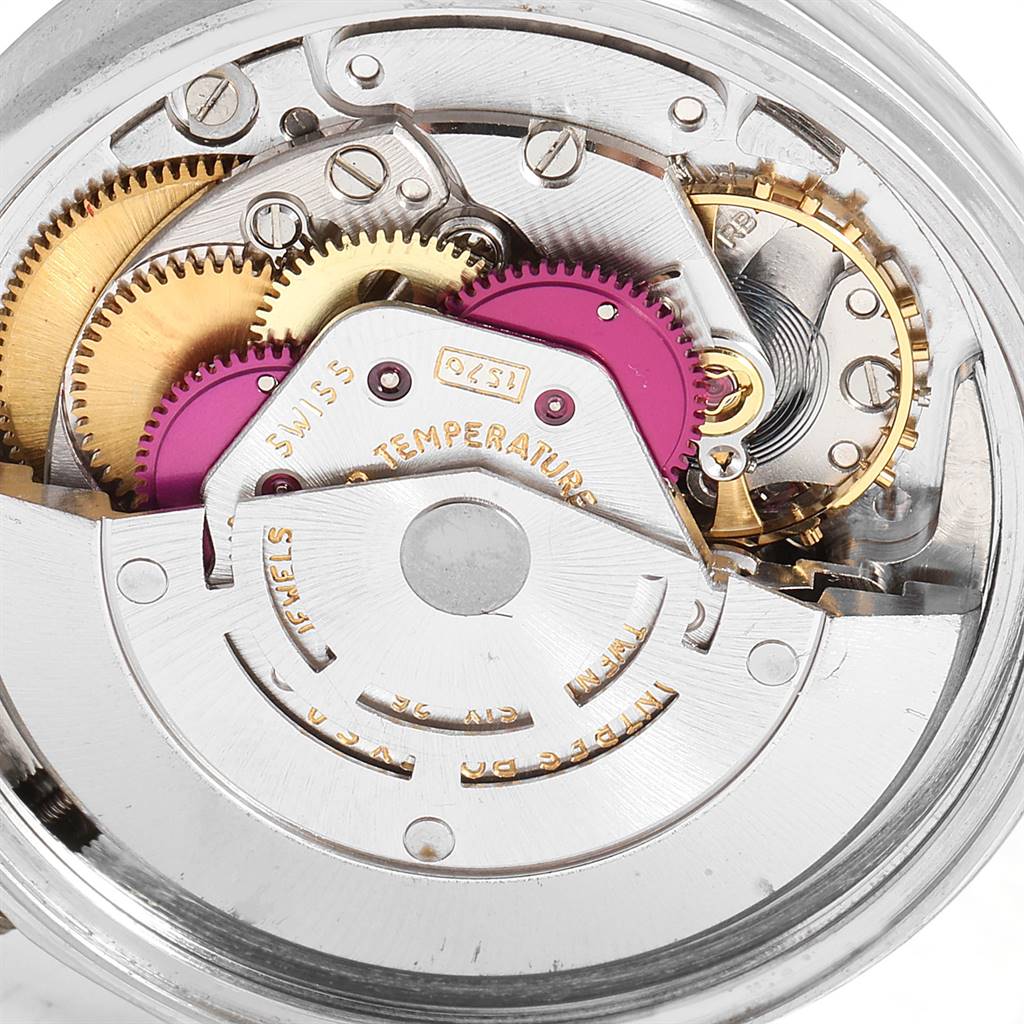 This image shows the internal mechanics and gears of the Rolex Vintage Collection 1601 Men's Stainless Steel Grey Dial 1601 Men's Stainless Steel Grey Dial watch from a back angle.
