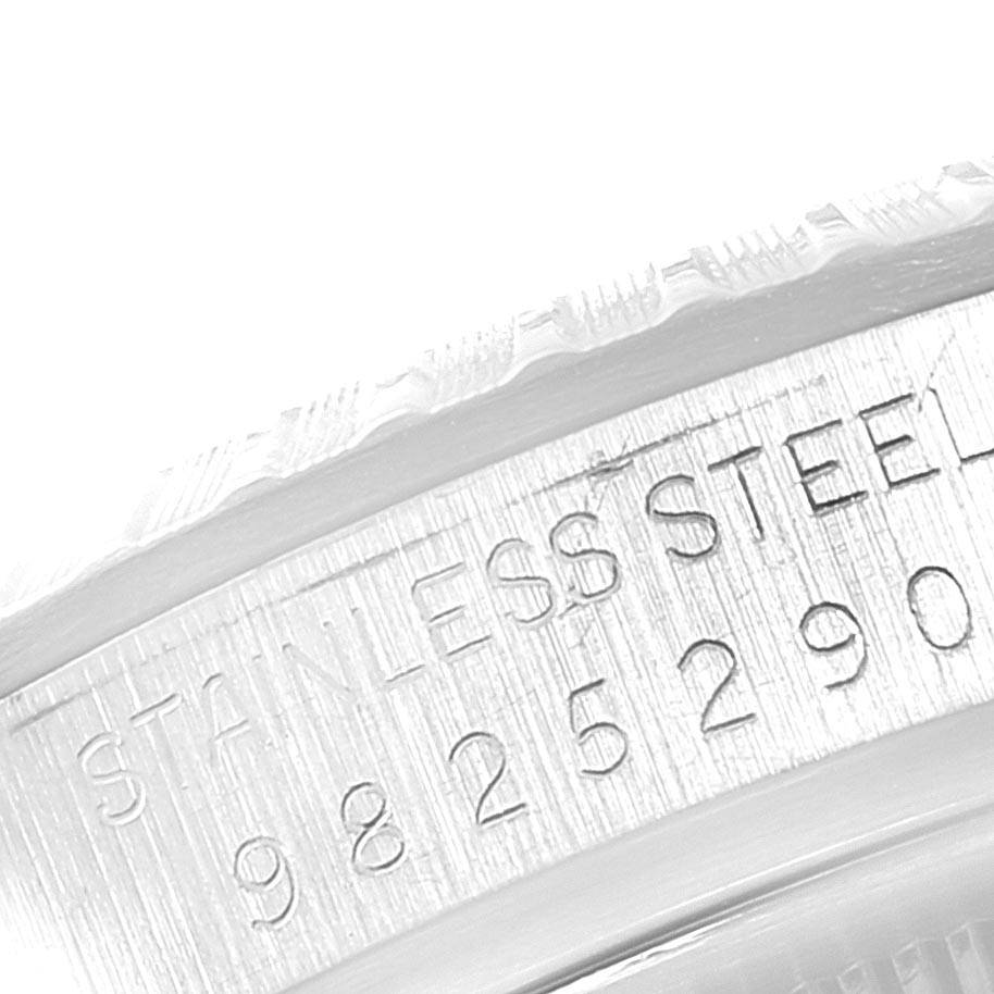 This image shows a close-up view of the engraved serial number and material marking (stainless steel) on the side of a Rolex Vintage Collection 16030 Men's Stainless Steel Grey Dial 16030 Men's Stainless Steel Grey Dial watch case.