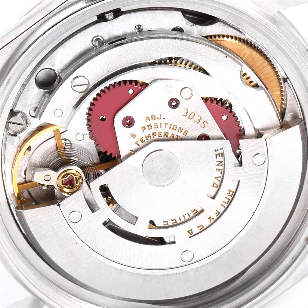 This image shows the inner movement parts of a Vintage Collection Rolex watch, viewed from the back case angle.