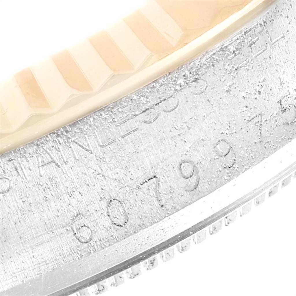 The image shows a close-up of the side engraved with "STAINLESS STEEL" of the Rolex Vintage Collection 16013 Men
s Stainless Steel Silver Dial 16013 Men
s Stainless Steel Silver Dial watch.